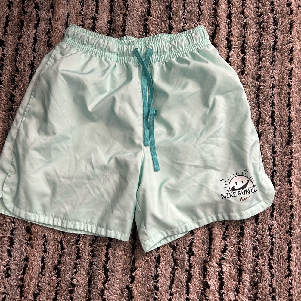 teal nike sun club woven flow shorts